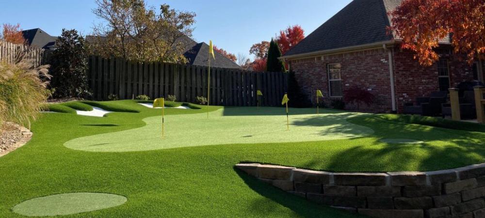 private putting green installed in back yard