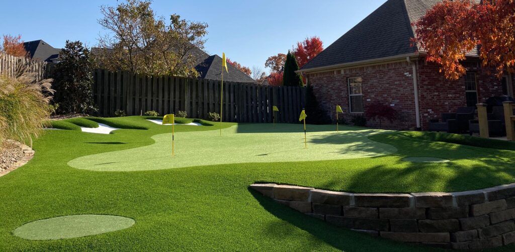 private putting green installed in back yard