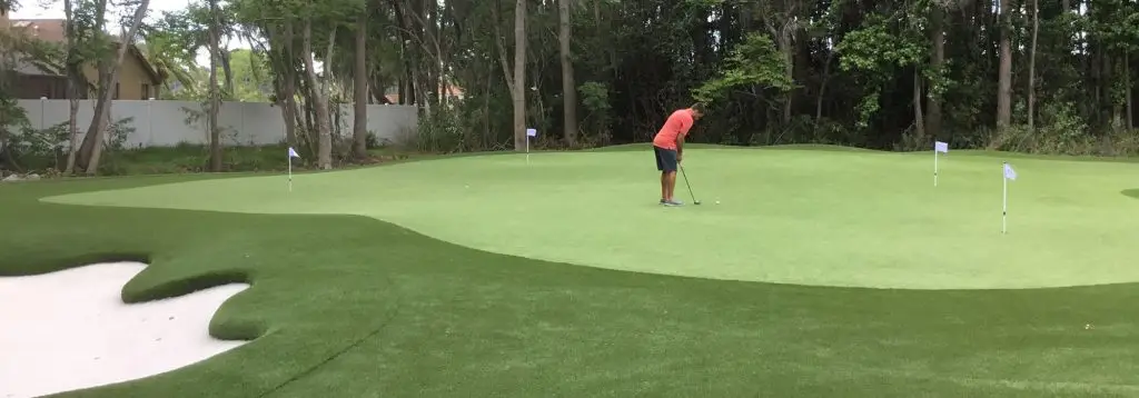 putting practice on a private putting green
